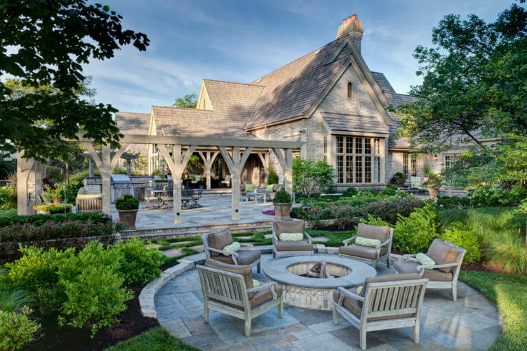 fire pit and seating area in luxury landscape design for Thomas home in Wheaton, IL